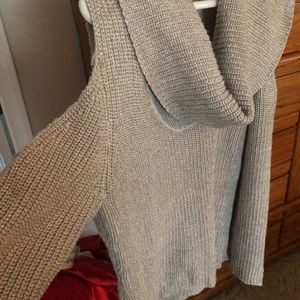 Used but in good condition, open shoulder sweater